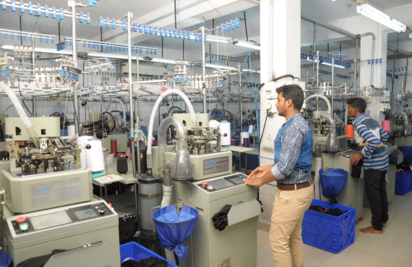 Computerised sock knitting machines running on the factory floor